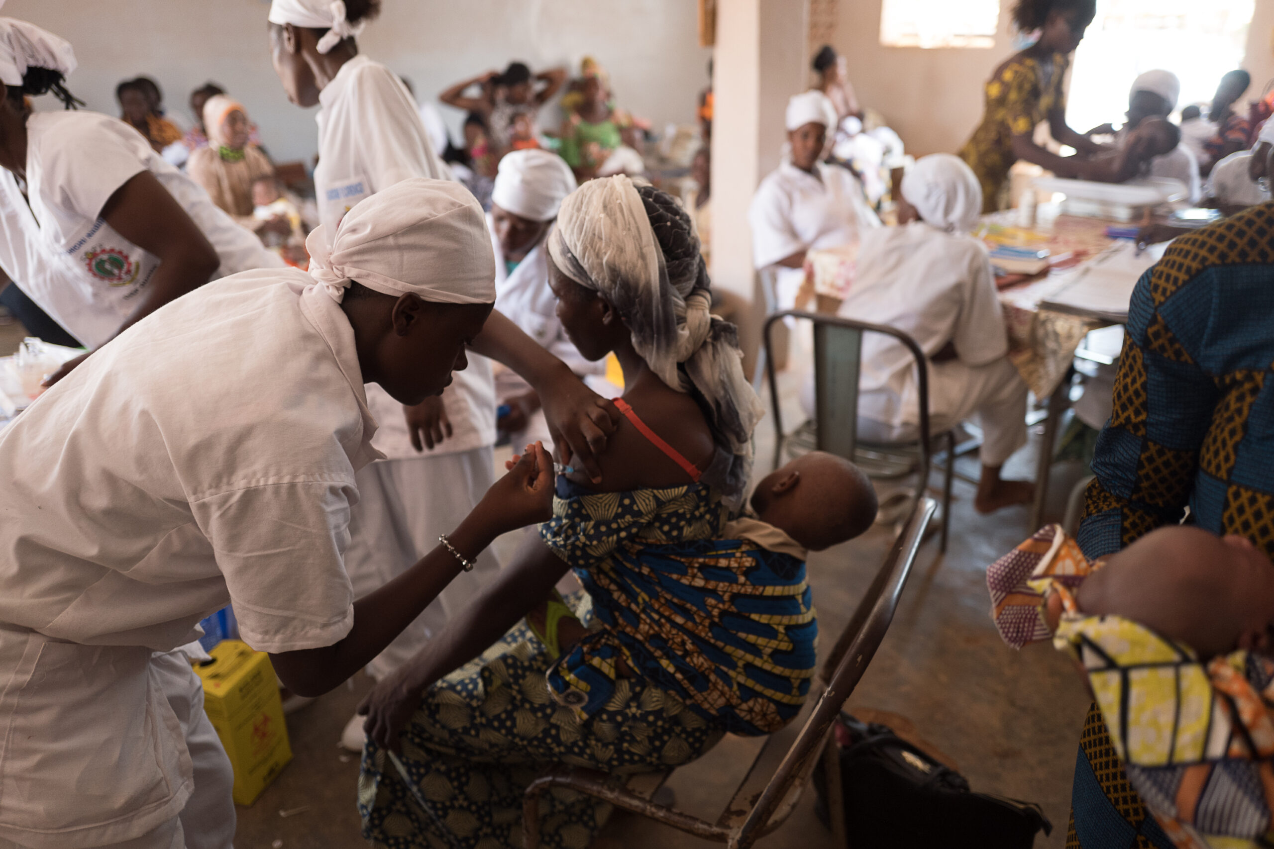 Scenes of FP counseling sessions and and an implant insertion at the CSPS Dassasgho in Ouagadougou