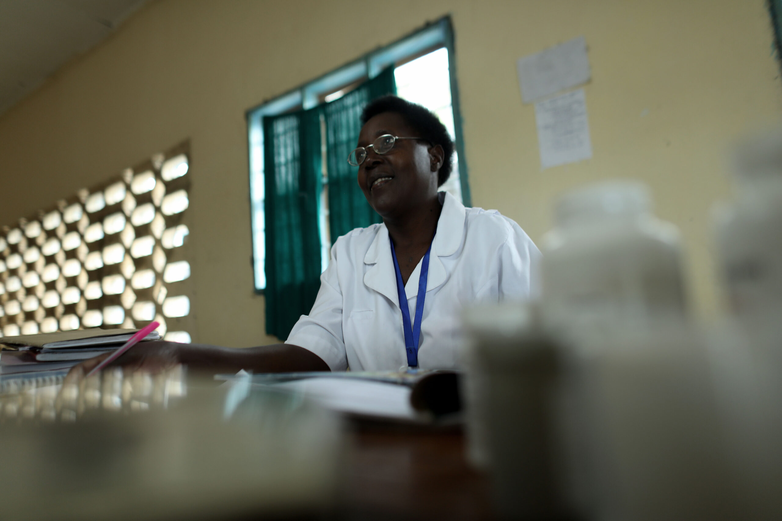 11 May 2018.On the remote Island of Ukerewe on Lake Victoria, IntraHealth is working with local government counter parts to bring VMMC programs to the men of the community, helping to reduce the spread of HIV and improve over all health. .In the village of Namainda Itibi the local satellite health clinic is hosting IntraHealth’s four-week campaign. There we met with folks, did interviews and photographed some you people undergoing the process

.Husband and Wife -.Godfrey Musibha, 47, recently underwent VMMC after hearing about through a PSA. (at their home).“I knew I was HIV positive before I got the VMMC service
When I found out I was HIV positive I wanted to keep my wife HIV free
I am now a Lay Councilor for CDC and a village leader. I teach local community members about VMMC and how to use a condom properly. .Both my wife and I talk about feeling cleaner than before. .People I know loving with HIV I help train about prevention.”
Sikuwajdou Vumilia, 35, .“I met him only when he came to engage me in 2003. We have a half-acre farm .When I found out he was positive I had to accept because I would have no idea where to go
He didn’t tell me he was going to get circumcised. I was mad he didn’t tell me because why would he lie. I was happy he did it. It has had a positive impact on our sexual life. My youngest is 8 and I’ll advise her to protect herself when she grows up.”.
January, 23, fisherman
“Heard about the campaign through a PSA on the radio. .I was circumcised on March 7th.Wasn’t afraid because my mind was made up to do it
My wife had been insisting I do it
I haven’t seen her since I did it, and I haven’t told her about it because after she miscarried she went back to her families village and we haven’t met since then
My brother convinced me to do it, he said it’d help reduce disease
My three-year-old son has already been circumcised
My wife will be happy when she finds out. .She worries because I fish at night, so she thinks I might be sleeping around but I don’t. I love her after all.”
Nangale Ectina – (fisherman wearing checked wrapper)
Khadija Butemi, 21 (Woman in red hat –married couple).“I convinced my husband to get the procedure. .He got it through the campaign
He was frequently getting STI’s and passing them on to me
My husband was smelling
I convinced him because I was tired of this
I have seen changes in my sex life, and it feels better now too. .We have one daughter who is one-year-old. I want another but will wait another 5 years
I love and respect my husband so I won’t have other sexual partners. And I fear HIV.”

Jafer John, __ (Purple Adidas shirt - married couple).“We fisherman heard about the free VMMC services in March. We sat down together to decide .I enjoy sex more now. .Because what I learned about infections and HIV .I’d like to see these kinds of services scaled up and I advocate for other fisherman .I fish twice a day and I get 1500 to 3000 per fish.”.
Nanzula Jactaja, 43 (Community Health Worker).Community Sensitizer on HIV and TB.In 2003 my husband died of TB and left me with four young kids.A few years after my husbands death I learned about TB and realized he had died from it
In 2009 I was trained as a community health adviser.I am happy being a community health worker
I had TB for 6 months last year.At first my clients didn’t trust me
Now people cooperate when they understand what I am doing
At first  I cared for 11 people and now I over see 40 people, mostly are youth
I got two new clients this week and both were 18 male and female.
Experamila Paulo Nangero, 45 (Nurse).In 1994 I became a midwife, and since then I have been trained by lots of organizations
I only council on the procedures, but I assist the doctor
For the men and boys who come for VMMC the most popular age group is 10-29


Background:.IntraHealth is working in Tanzania, bringing a CDC program that helps promote young men to become circumcised in an effort to bring better health care and prevent the spread of HIV.  .IntraHealth.Namuh Media.Photos by Josh Estey., 11 May 2018.On the remote Island of Ukerewe on Lake Victoria, IntraHealth is working with local government counter parts to bring VMMC programs to the men of the community, helping to reduce the spread of HIV and improve over all health. .In the village of Namainda Itibi the local satellite health clinic is hosting IntraHealth’s four-week campaign. There we met with folks, did interviews and photographed some you people undergoing the process

.Husband and Wife -.Godfrey Musibha, 47, recently underwent VMMC after hearing about through a PSA. (at their home).“I knew I was HIV positive before I got the VMMC service
When I found out I was HIV positive I wanted to keep my wife HIV free
I am now a Lay Councilor for CDC and a village leader. I teach local community members about VMMC and how to use a condom properly. .Both my wife and I talk about feeling cleaner than before. .People I know loving with HIV I help train about prevention.”
Sikuwajdou Vumilia, 35, .“I met him only when he came to engage me in 2003. We have a half-acre farm .When I found out he was positive I had to accept because I would have no idea where to go
He didn’t tell me he was going to get circumcised. I was mad he didn’t tell me because why would he lie. I was happy he did it. It has had a positive impact on our sexual life. My youngest is 8 and I’ll advise her to protect herself when she grows up.”.
January, 23, fisherman
“Heard about the campaign through a PSA on the radio. .I was circumcised on March 7th.Wasn’t afraid because my mind was made up to do it
My wife had been insisting I do it
I haven’t seen her since I did it, and I haven’t told her about it because after she miscarried she went back to her families village and we haven’t met since then
My brother convinced me to do it, he said it’d help reduce disease
My three-year-old son has already been circumcised
My wife will be happy when she finds out. .She worries because I fish at night, so she thinks I might be sleeping around but I don’t. I love her after all.”
Nangale Ectina – (fisherman wearing checked wrapper)
Khadija Butemi, 21 (Woman in red hat –married couple).“I convinced my husband to get the procedure. .He got it through the campaign
He was frequently getting STI’s and passing them on to me
My husband was smelling
I convinced him because I was tired of this
I have seen changes in my sex life, and it feels better now too. .We have one daughter who is one-year-old. I want another but will wait another 5 years
I love and respect my husband so I won’t have other sexual partners. And I fear HIV.”

Jafer John, __ (Purple Adidas shirt - married couple).“We fisherman heard about the free VMMC services in March. We sat down together to decide .I enjoy sex more now. .Because what I learned about infections and HIV .I’d like to see these kinds of services scaled up and I advocate for other fisherman .I fish twice a day and I get 1500 to 3000 per fish.”.
Nanzula Jactaja, 43 (Community Health Worker).Community Sensitizer on HIV and TB.In 2003 my husband died of TB and left me with four young kids.A few years after my husbands death I learned about TB and realized he had died from it
In 2009 I was trained as a community health adviser.I am happy being a community health worker
I had TB for 6 months last year.At first my clients didn’t trust me
Now people cooperate when they understand what I am doing
At first  I cared for 11 people and now I over see 40 people, mostly are youth
I got two new clients this week and both were 18 male and female.
Experamila Paulo Nangero, 45 (Nurse).In 1994 I became a midwife, and since then I have been trained by lots of organizations
I only council on the procedures, but I assist the doctor
For the men and boys who come for VMMC the most popular age group is 10-29


Background:.IntraHealth is working in Tanzania, bringing a CDC program that helps promote young men to become circumcised in an effort to bring better health care and prevent the spread of HIV.  .IntraHealth.Namuh Media.Photos by Josh Estey.